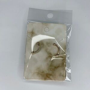 Gold curved earrings